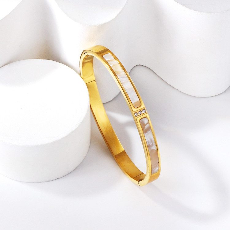 Elegant Gold-Toned Bangle Bracelet with Mother-of-Pearl Inlay