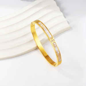 Elegant Gold-Toned Bangle Bracelet with Mother-of-Pearl Inlay