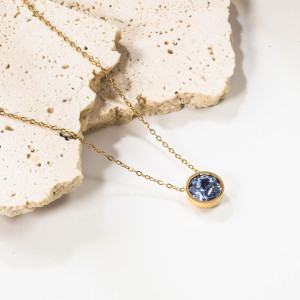 Elegant Gold Necklace with Light Blue Pendant