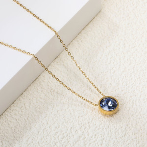 Elegant Gold Necklace with Light Blue Pendant