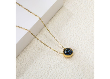 Elegant Gold-Toned Necklace with Deep Blue Pendant