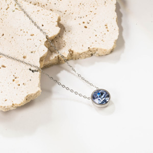 Elegant Silver Necklace with Light Blue Gemstone Pendant