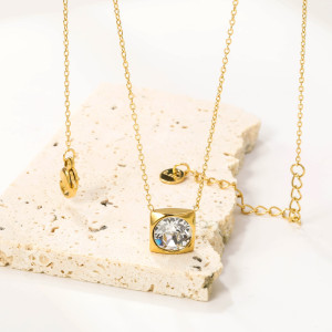 Elegant Gold Pendant Necklace with Clear Stone