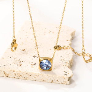 Elegant Gold-Tone Necklace with Sparkling Blue Pendant