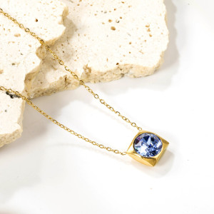 Elegant Gold-Tone Necklace with Blue Gemstone Pendant