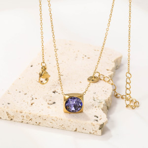 Elegant Gold-Tone Pendant Necklace with Purple Gemstone