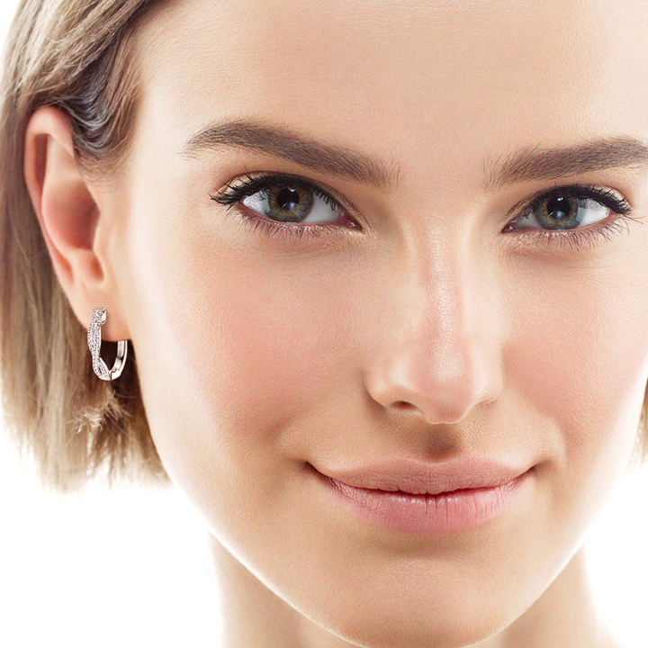 moissanite hoop earrings worn on ear minimal luxury jewelry
